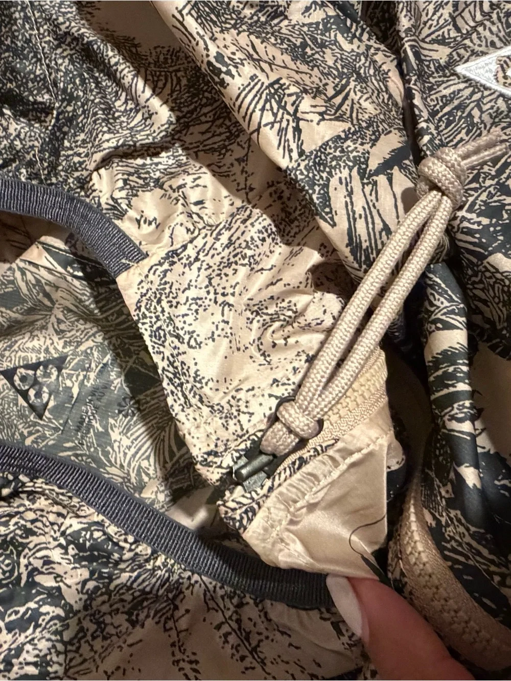 Nike ACG Hooded Jacket in Desert Tan and Black Nature Print